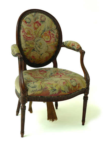 Appraisal: A LOUIS XVI STYLE WALNUT FAUTEUIL The oval floral tapestry