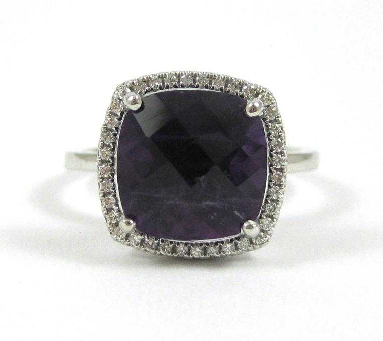 Appraisal: AMETHYST DIAMOND AND FOURTEEN KARAT GOLD RING The white gold