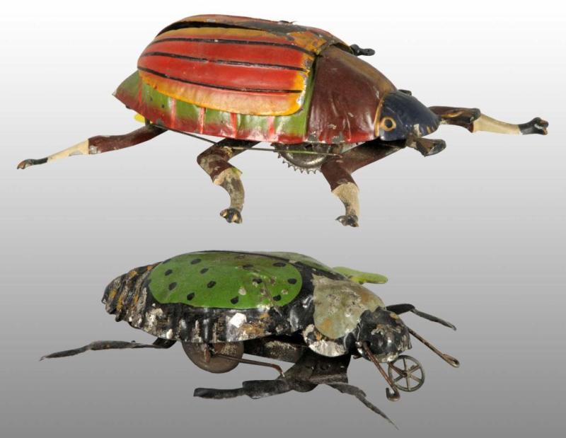 Appraisal: Lot of Tin Hand-Painted Beetle Wind-Up Toys Description German Working