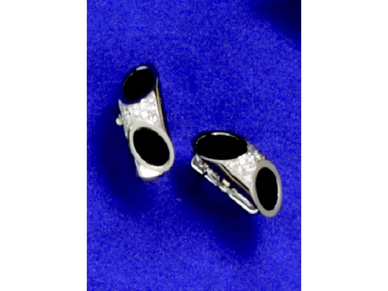 Appraisal: ONYX AND DIAMOND CUFF LINKS k white gold with inset