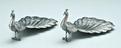 Appraisal: Pair Gorham sterling peacocks cast standing peacocks each with tail