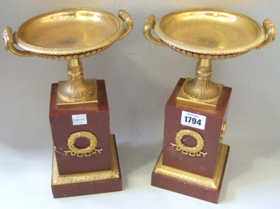 Appraisal: A pair of gilt bronze mounted rosso antico marble garnitures