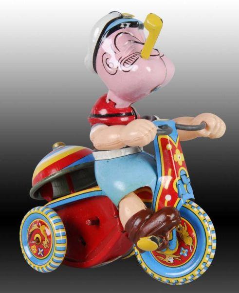 Appraisal: Linemar Popeye Mechanical Tricycle Toy Description Original box Wind-up Working