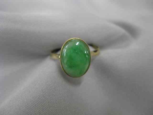 Appraisal: Jade Ring fine apple green stone in kyellow gold