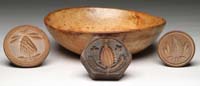 Appraisal: WOOD BOWL AND THREE BUTTER MOLDS Early maple chopping bowl