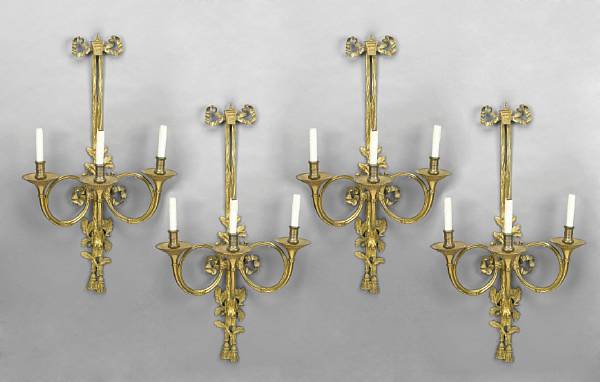 Appraisal: A set of four Empire style gilt bronze three light