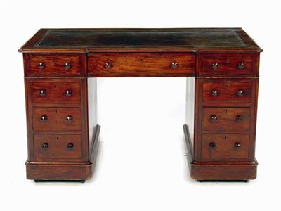 Appraisal: A Victorian mahogany pedestal desk the leather inset top to