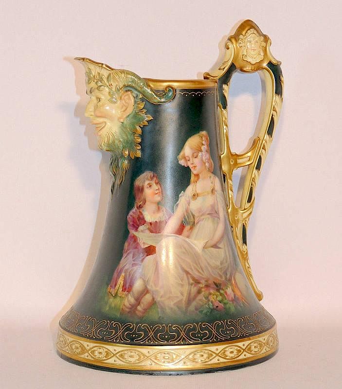 Appraisal: Royal Vienna Porcelain Pitcher With portrait panel and mask-form spout