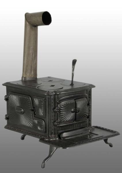 Appraisal: Cast Iron Southard Little Eva Child's Stove Toy Description Circa