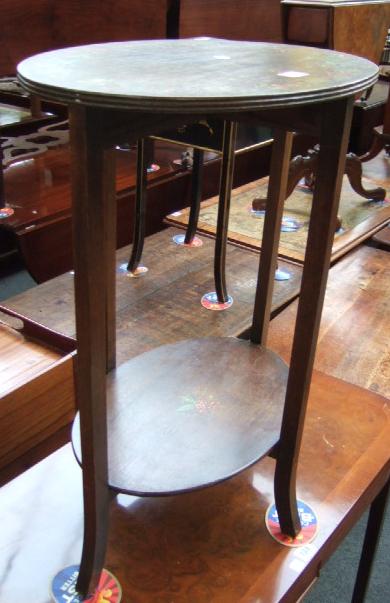 Appraisal: An oak two tier oval table the top painted with