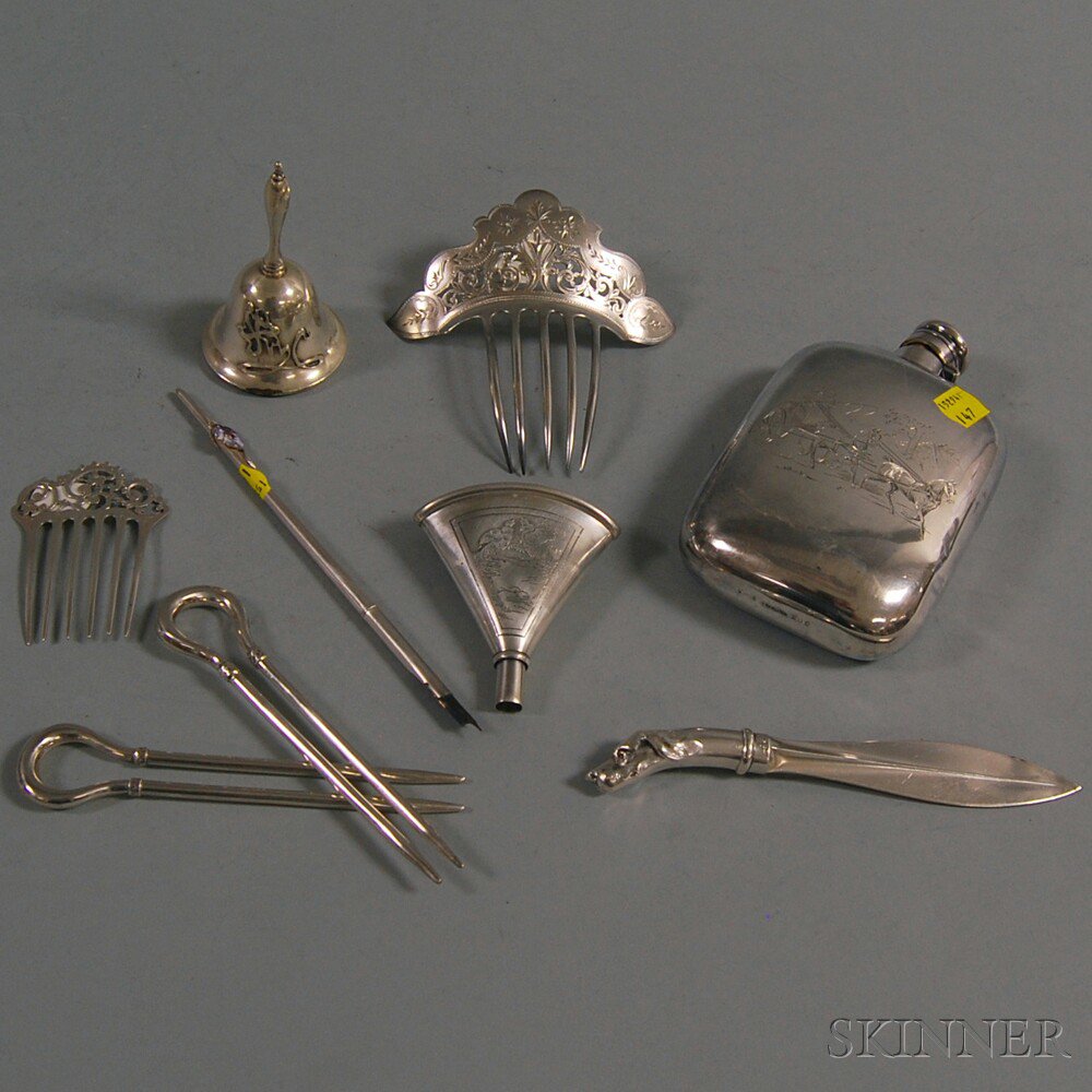 Appraisal: Nine Sterling Silver Personal Items two hair combs the larger