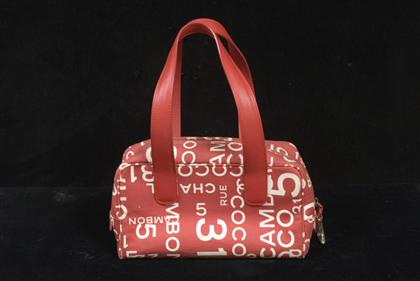 Appraisal: Red and white Chanel travel toiletry bag s Cotton twill