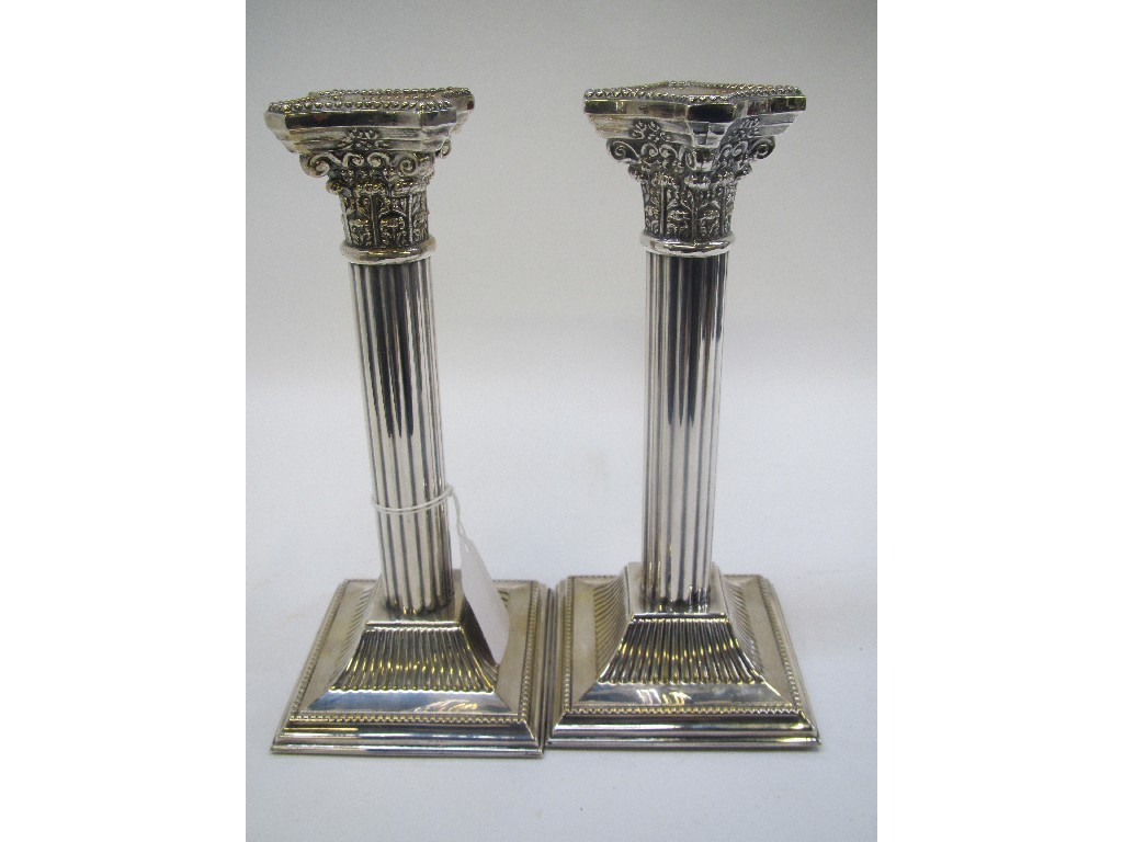 Appraisal: Pair of silver plated Corinthian column candl