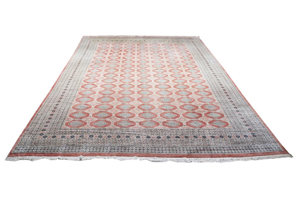 Appraisal: BOKHARA STYLE RUST BEIGE FIELD CARPET ' x ' Condition