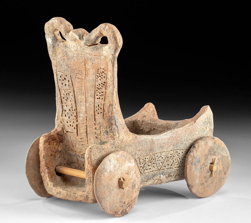 Appraisal: Important Canaanite Terracotta Wheeled Chariot Toy Ancient Near East Canaan