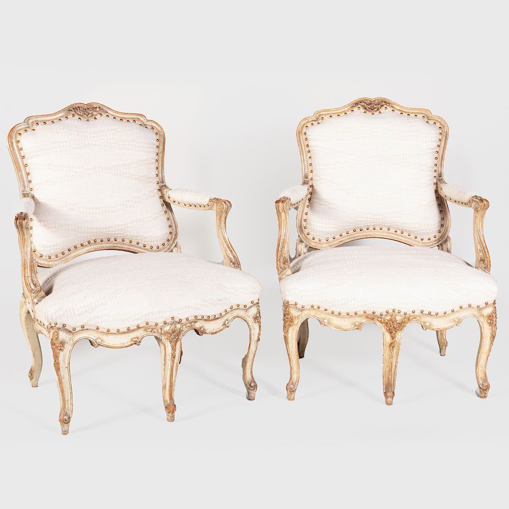 Appraisal: Pair of Louis XV Style Cream Painted and Parcel-Gilt Fauteuils