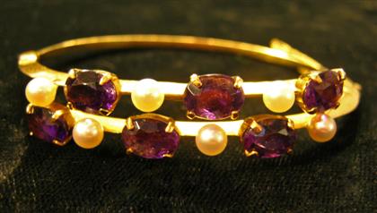 Appraisal: karat yellow gold pearl and amethyst bangleAlternating six oval cut