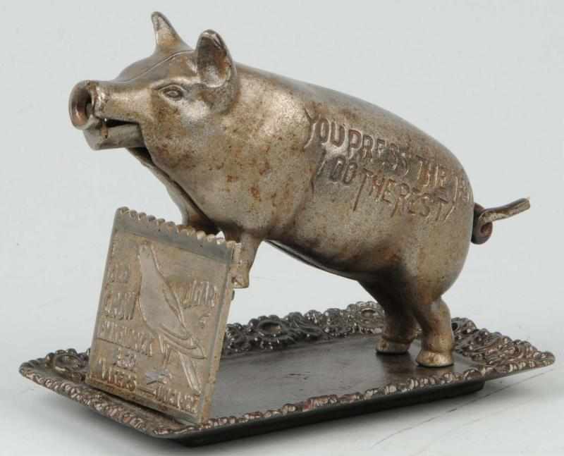 Appraisal: Metal Figural Pig Cigar Cutter Description Advertising Old Crow Cigars