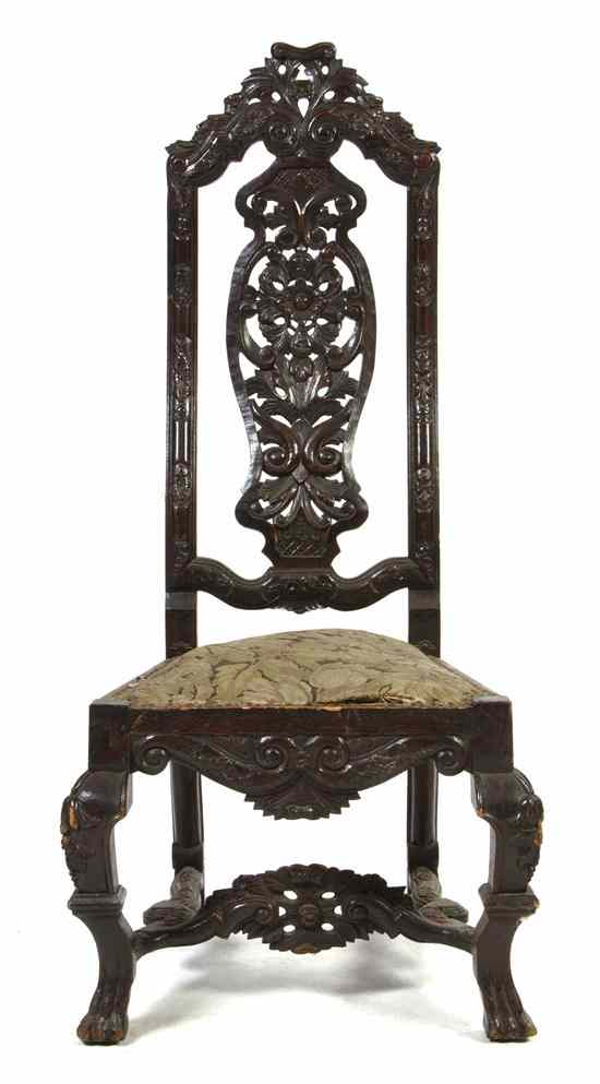 Appraisal: A Renaissance Revival Carved Hall Chair having pierce carved crest