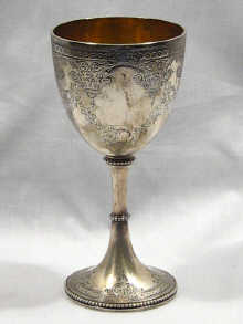 Appraisal: An English hallmarked silver goblet finely engraved dated cm high