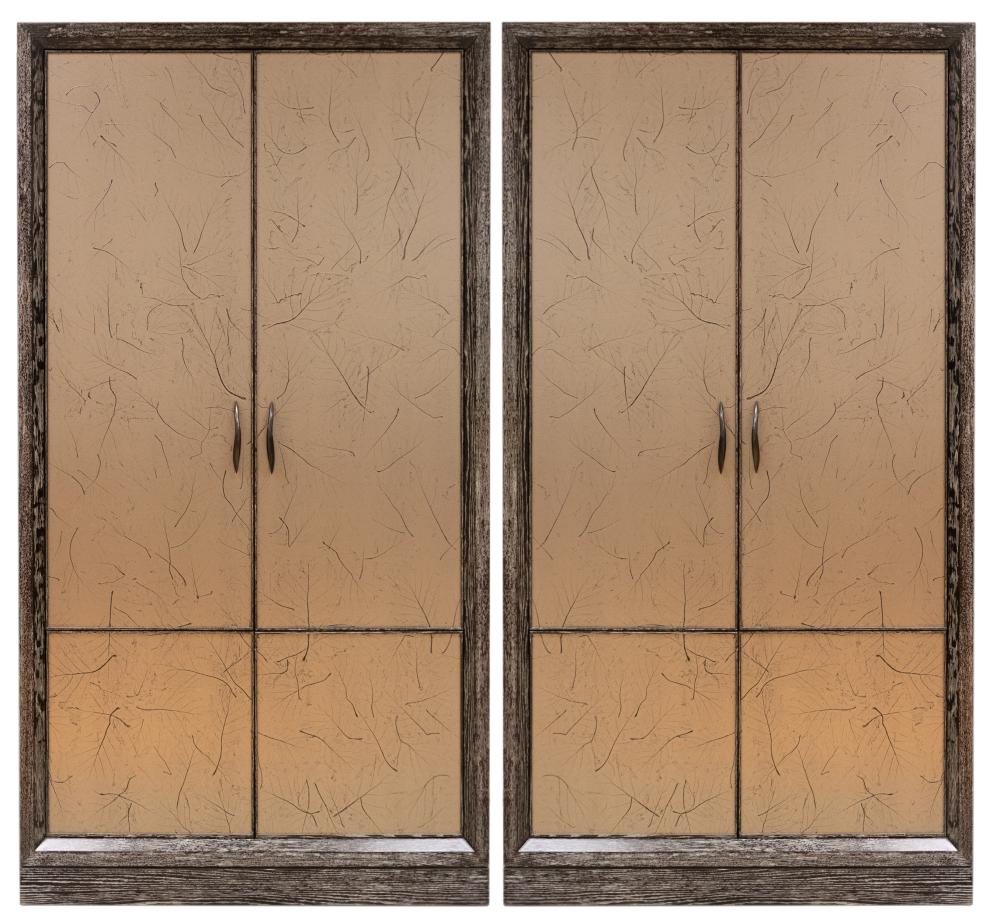 Appraisal: PAIR OF CONTEMPORARY CABINETSebonized and metallic-finish wood unsigned the doors