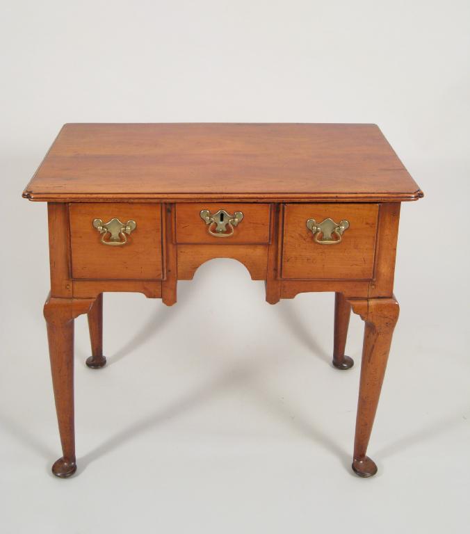 Appraisal: An th Century cherrywood Lowboy of small proportions with moulded