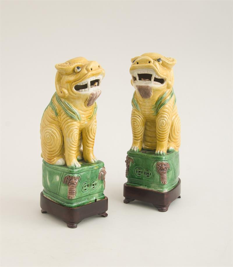 Appraisal: PAIR OF CHINESE GLAZED BISCUIT FIGURES OF SEATED FU DOGS