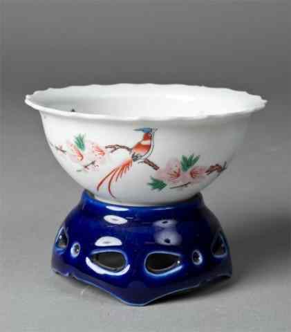 Appraisal: Chinese Porcelain Bowl on Porcelain StandBowl finely painted to depict