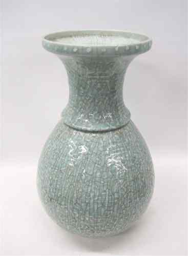 Appraisal: CHINESE CELEDON PORCELAIN VASE with crackle finish and a raised