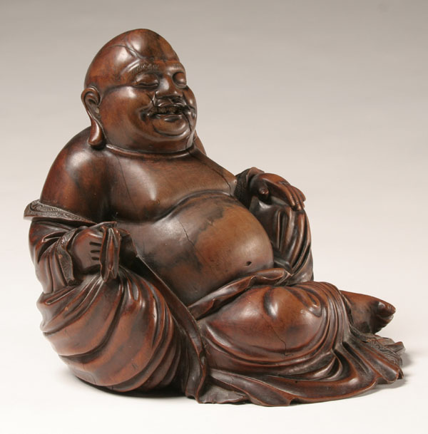 Appraisal: Expertly carved hardwood Buddha figure H x D Several splits