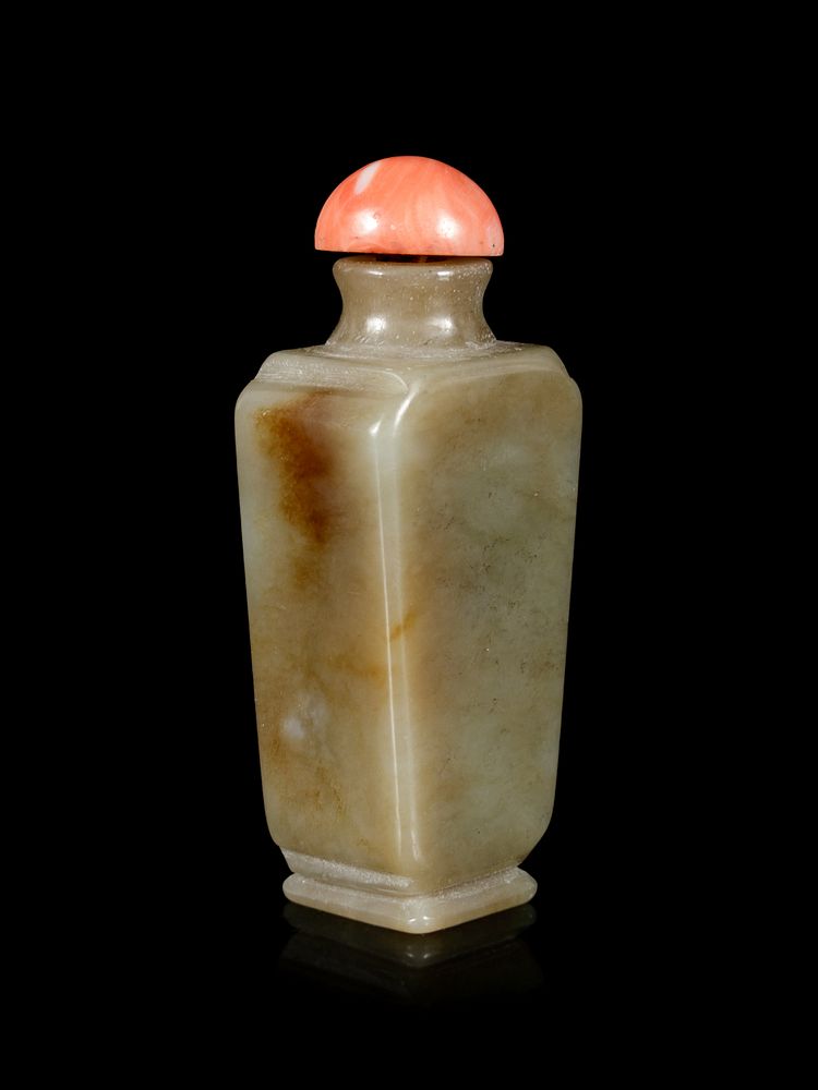 Appraisal: A Russet and Celadon Jade Snuff BottleHeight overall in A