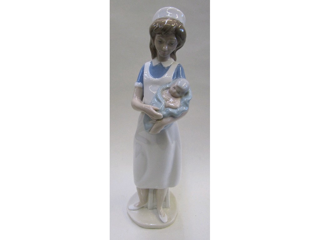 Appraisal: Nao figure of a nurse holding a baby