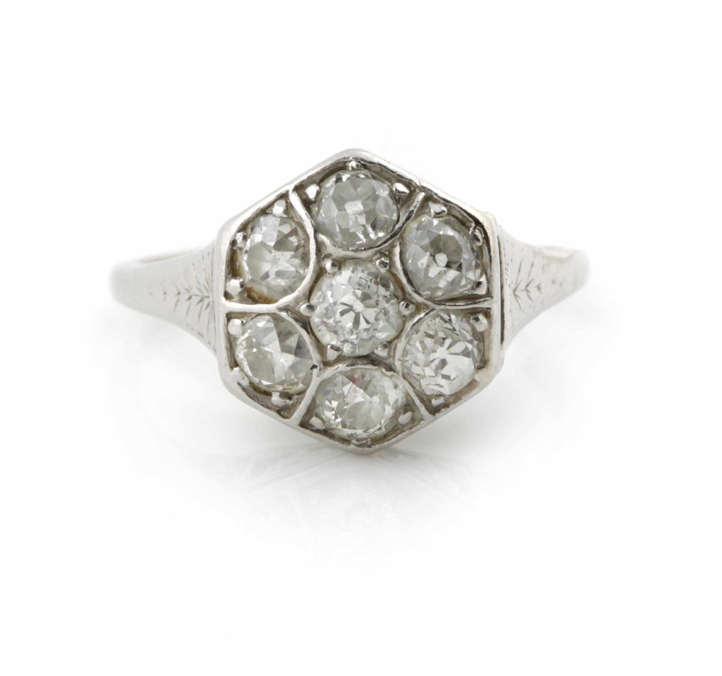 Appraisal: A diamond and platinum cluster ring set throughout with old