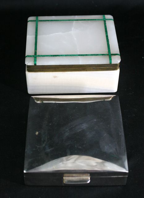 Appraisal: A sterling silver cigarette case and an onyx cigarette box