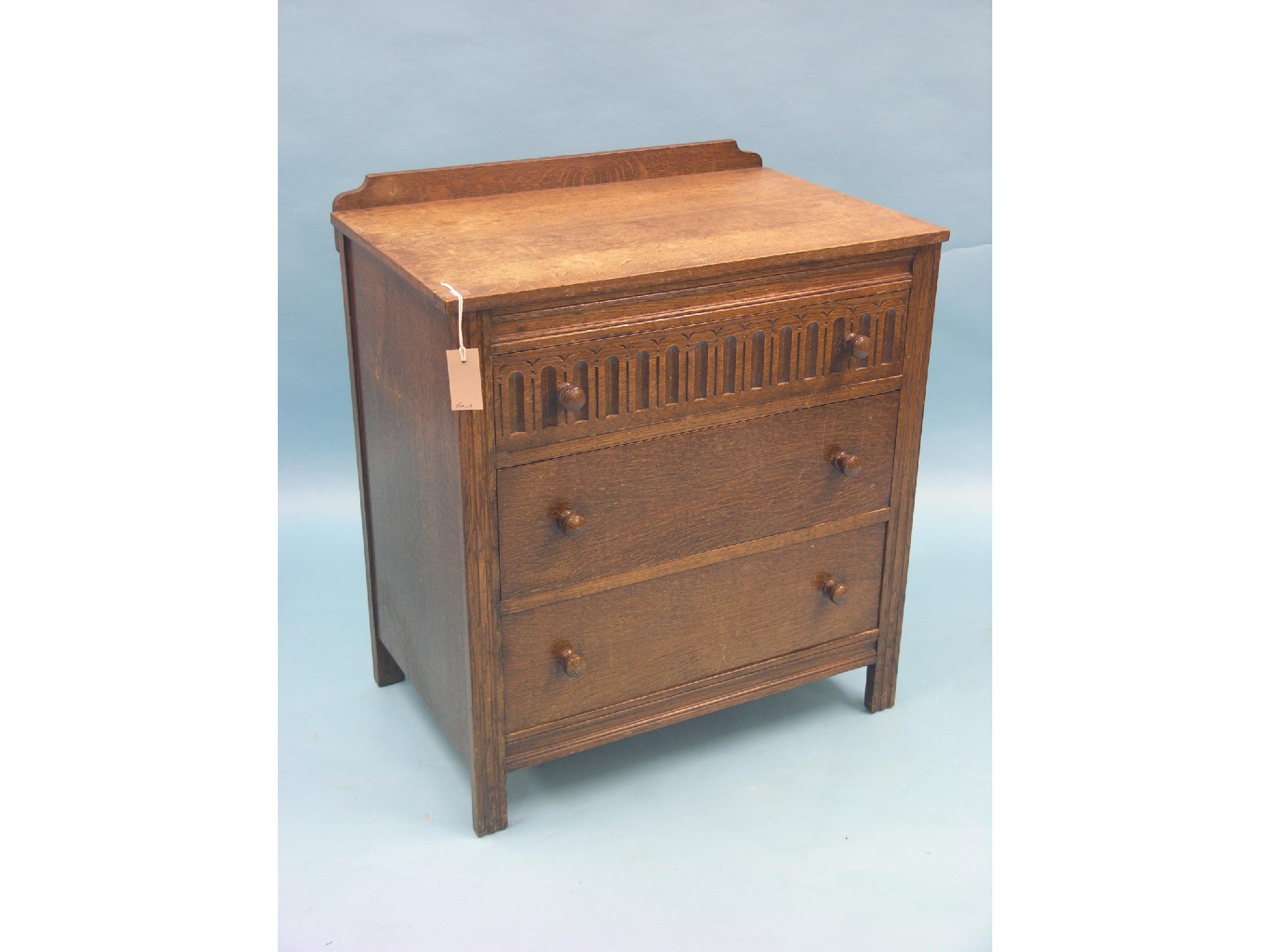 Appraisal: A pair of oak chests three drawers upper drawer with