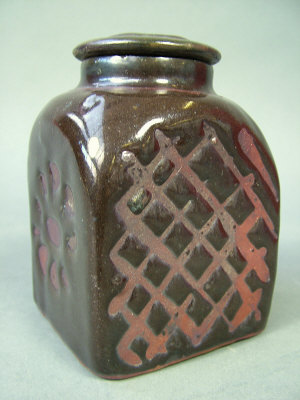 Appraisal: A Bernard Leach stoneware tea caddy the body covered in