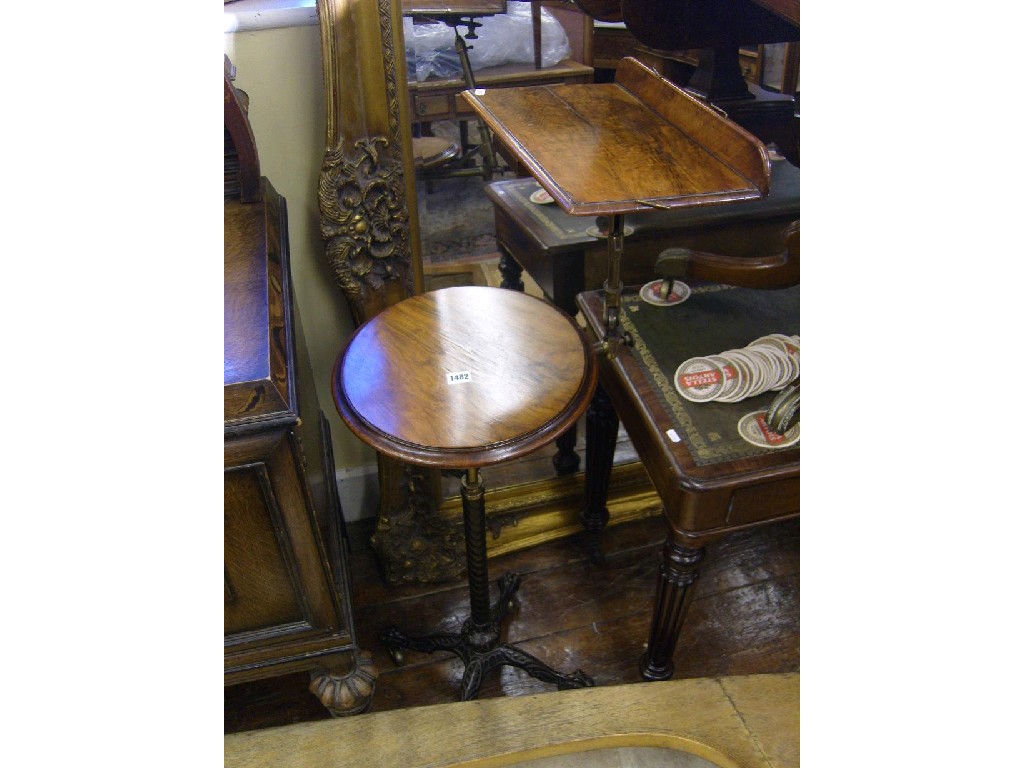 Appraisal: A Victorian telescopic reading music stand with walnut and figured