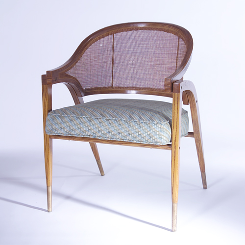 Appraisal: EDWARD WORMLEY DUNBAR Cane-back chair with fabric-upholstered seat cushion and