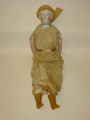 Appraisal: A parian shoulder head lady doll with painted face moulded