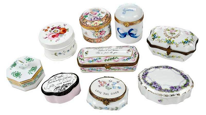 Appraisal: Nine Small Porcelain Ring Boxes French th century hand painted