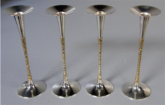 Appraisal: Stuart Devlin set of four silver candlesticks with textured gilt