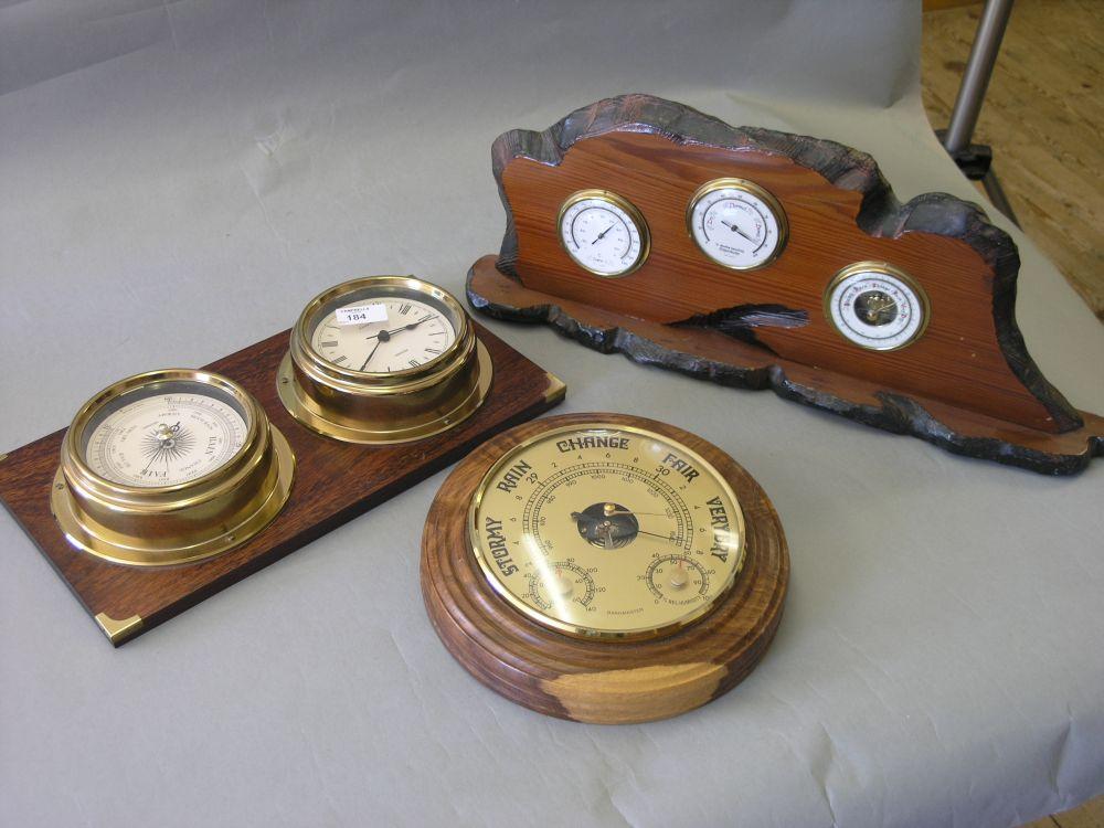 Appraisal: A Baromaster aneroid wall barometer two wall hanging ships clocks