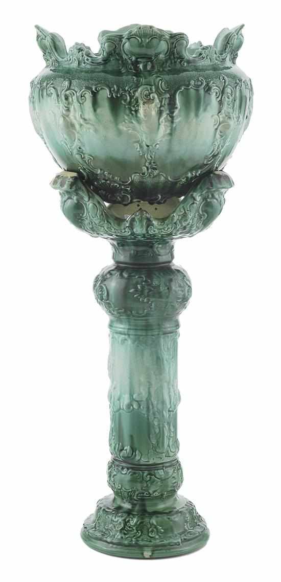 Appraisal: A VICTORIAN MAJOLICA JARDINIERE ON STAND The columnar stand with