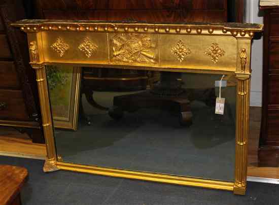 Appraisal: An early th century carved giltwood and gesso overmantel mirror