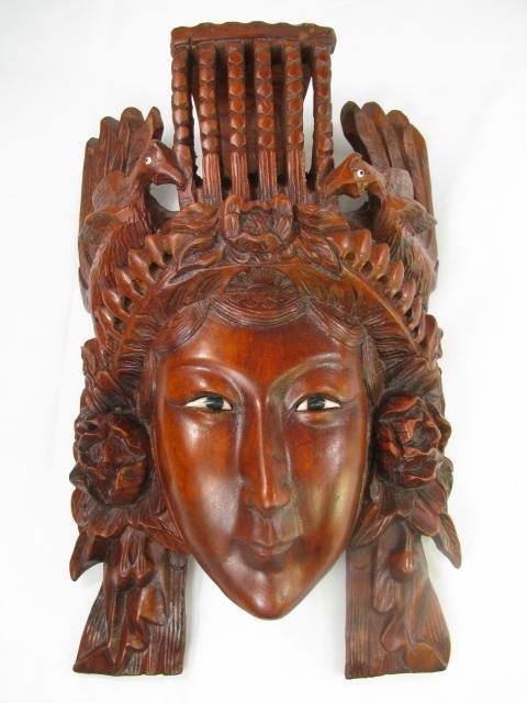 Appraisal: Carved wood mask with elaborate head piece of bird and