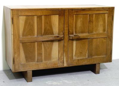 Appraisal: AN ARTS AND CRAFTS WALNUT CUPBOARD in the manner of