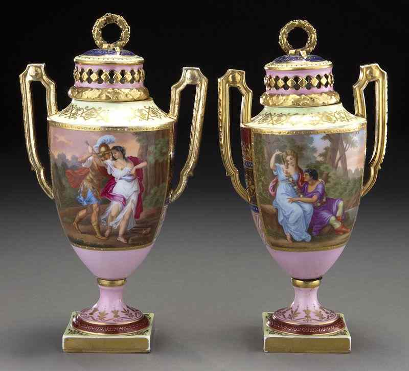 Appraisal: Pr Royal Vienna porcelain lidded urnsof pink yellow and burgundy