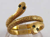 Appraisal: A yellow metal tests carat gold double snake ring size