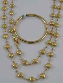 Appraisal: A hallmarked silver gilt necklace made up of silver gilt