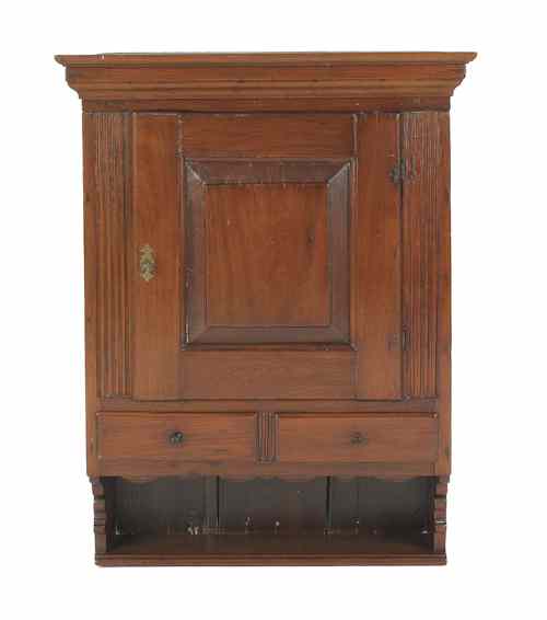 Appraisal: Lancaster County Pennsylvania Queen Anne walnut hanging cupboard ca with